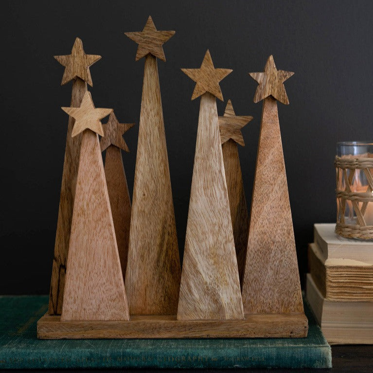 Seven Wooden Christmas Trees On Base